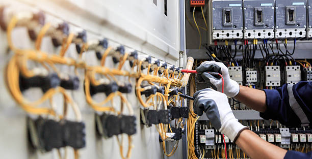 Professional Electrician technician working in Camp Swift, TX